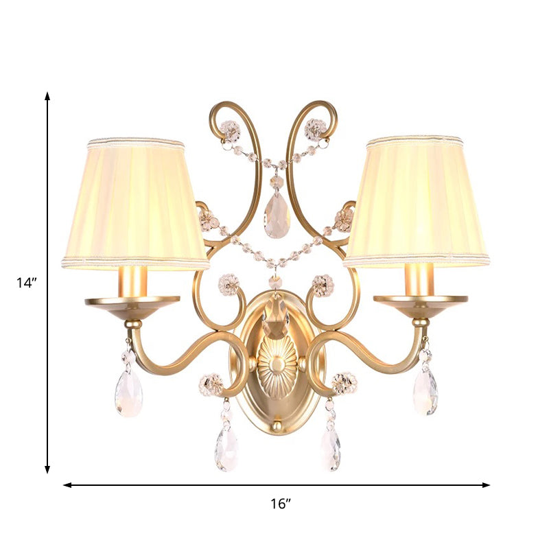 Contemporary Crystal Wall Sconce With Curved Arm And Brass Finish