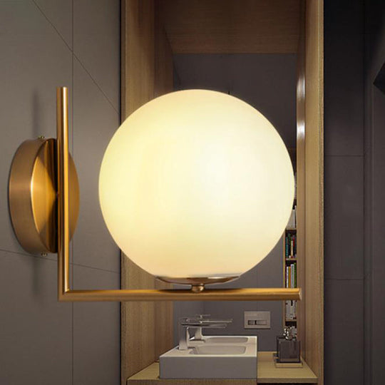 Modern Opal Glass Wall Sconce With Globe Shade And Gold Accent For Washroom Lighting / B