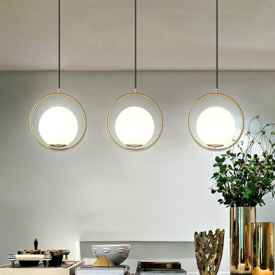 Globe Milky Glass 1-Bulb Pendant Light With Brass Loop – Modern Dining Room Suspension Lamp