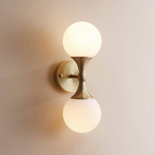 Ivory Glass Ball Wall Lamp With 2-Head Brass Sconce For Bedroom