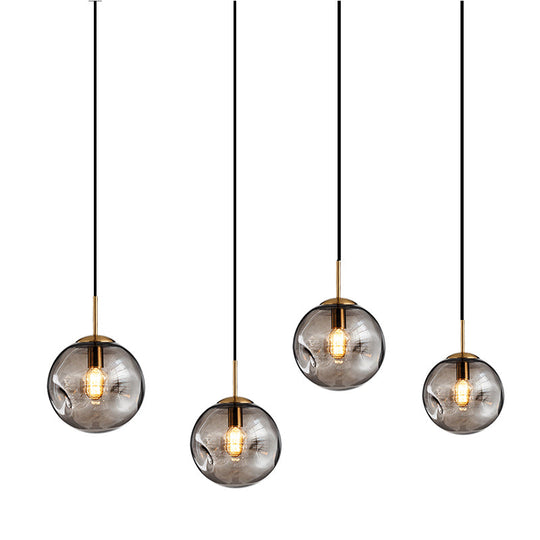 Postmodern Brass Pendant Lamp With Dimpled Glass Globe For Bedroom