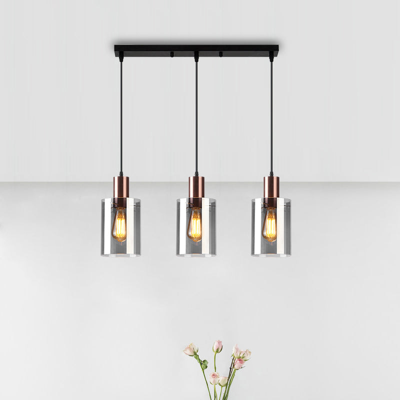Modern Rose Gold Cluster Pendant Light With Smoked Glass Ideal For Restaurants