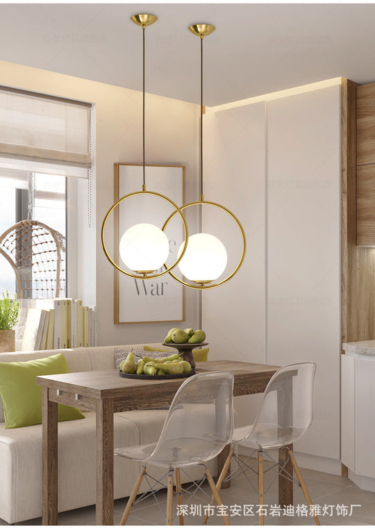 White Glass Pendant Light With Mid-Century Globe Design And Metal Ring