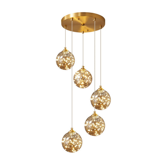 Amber Glass Led Pendant Lamp With Brass Finish - Nordic Style Lighting For Bedroom