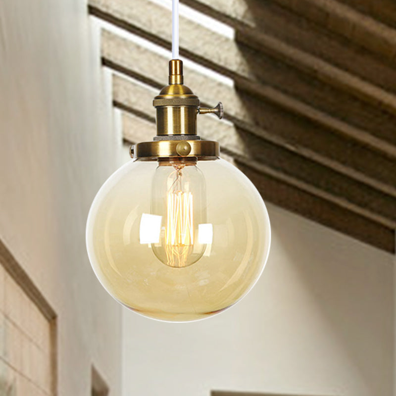 Farmhouse Orbit Pendant Light With Amber/Clear Glass And Adjustable Cord In 3 Elegant Finish