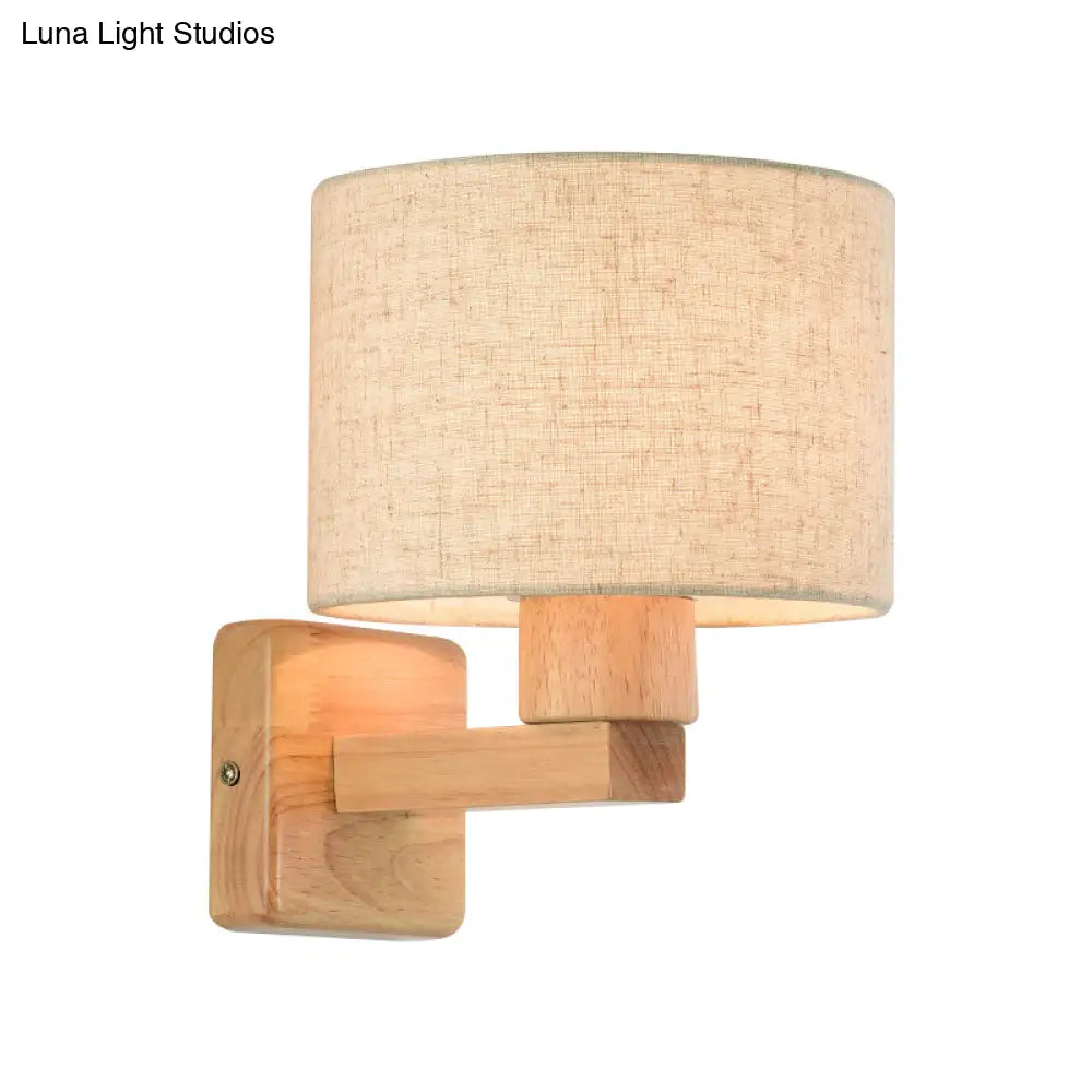 Asian Inspired Drum Wall Lamp With Wood Arm And Fabric Shade 1-Light Fixture For Bedroom