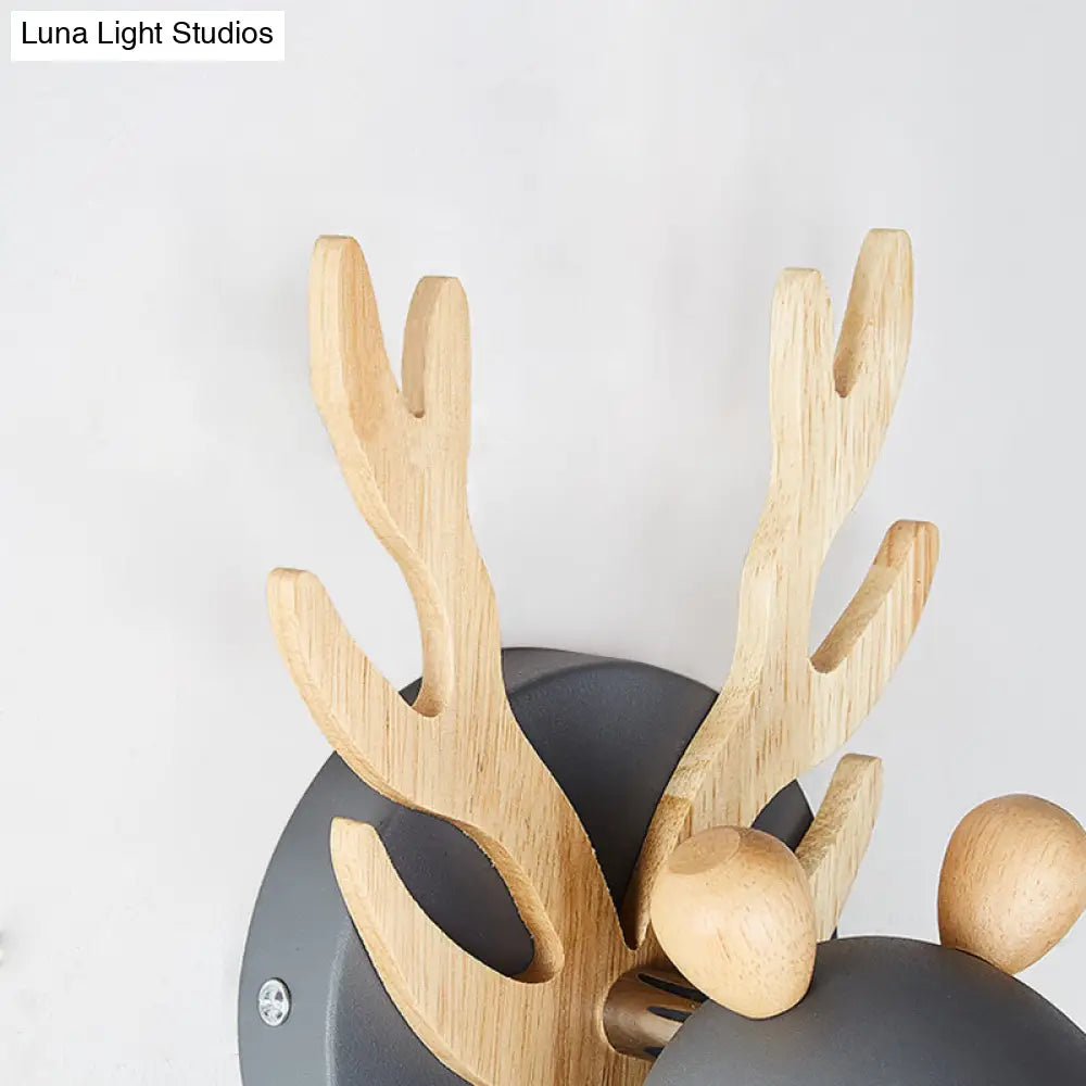 Modernist Metal Wall Sconce With Antler Design And Cylinder Shape For Bedroom Lighting