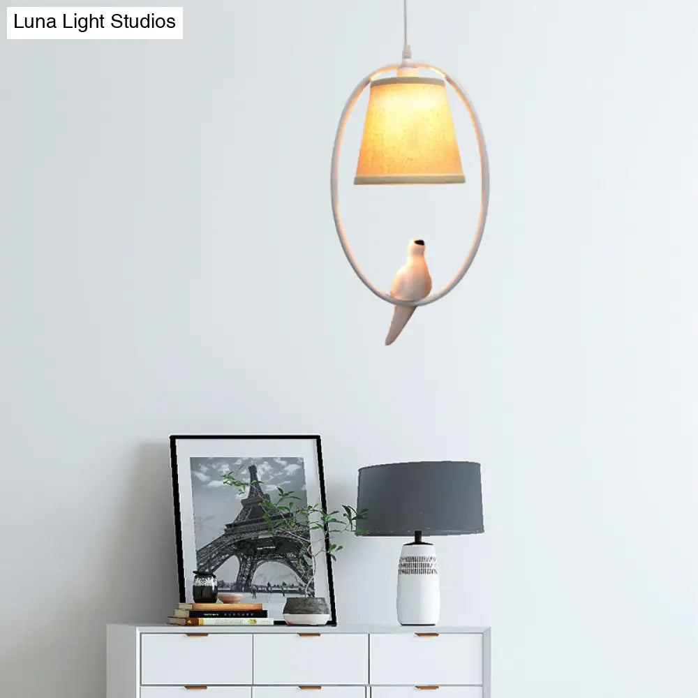 Rustic Beige Pendant Light With Bird Accent - Stylish Oval Metal Ceiling For Hotels
This Improved