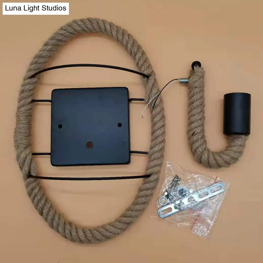 Rustic Indoor Wall Light With Wagon Wheel Design And Rope Shade