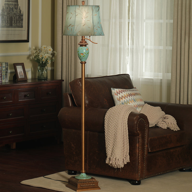 Blue Rustic Fabric Standing Lamp With Curved Vines Patterned Shade