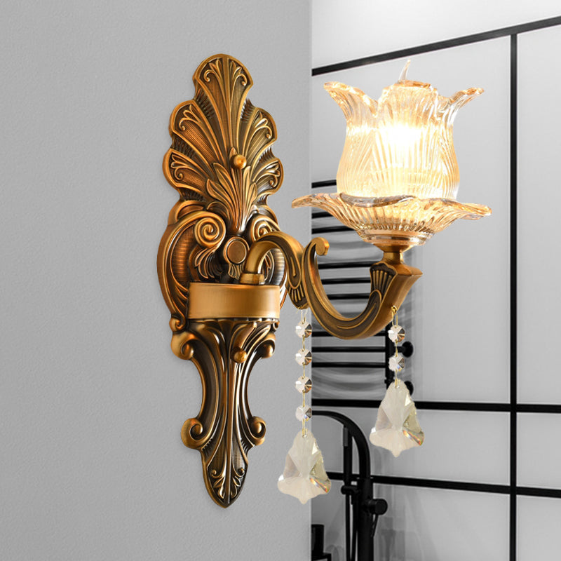 Traditional Brass Wall Sconce With Ribbed Glass And Floral Design