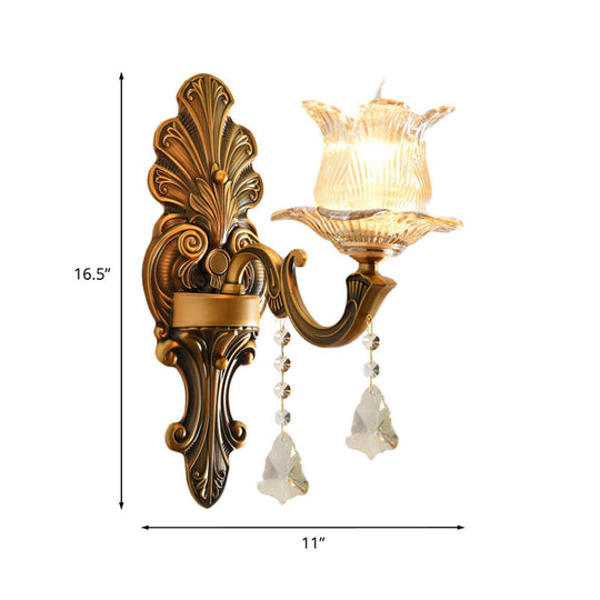 Traditional Brass Wall Sconce With Ribbed Glass And Floral Design