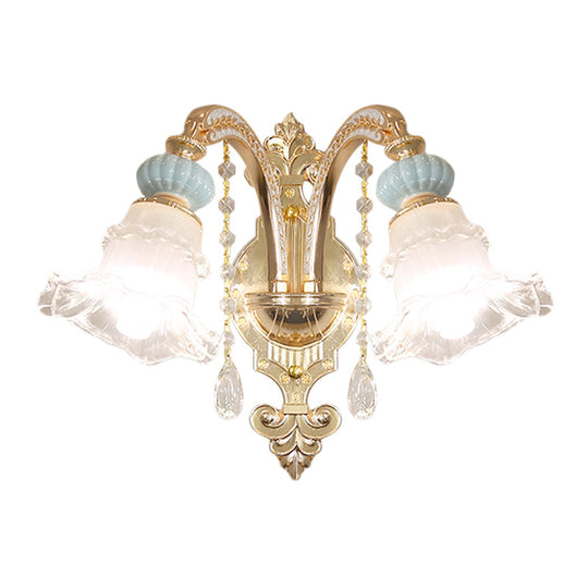 Traditional Blue Frosted Glass Wall Sconce With Ceramic Accent And Ruffle Trim