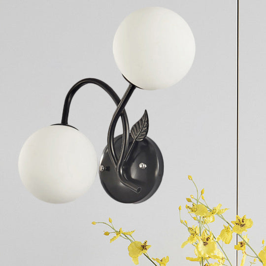 Sphere Sconce Light With Faceted Glass In Black For Modern Spaces