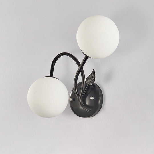 Sphere Sconce Light With Faceted Glass In Black For Modern Spaces