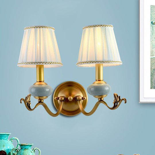 Traditional Style Brass Wall Sconce With Curved Arm Fabric Shade