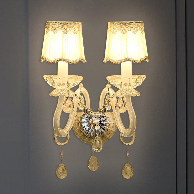 Traditional White Candle Wall Lamp With Clear Crystal Accent And Scalloped Fabric Shade