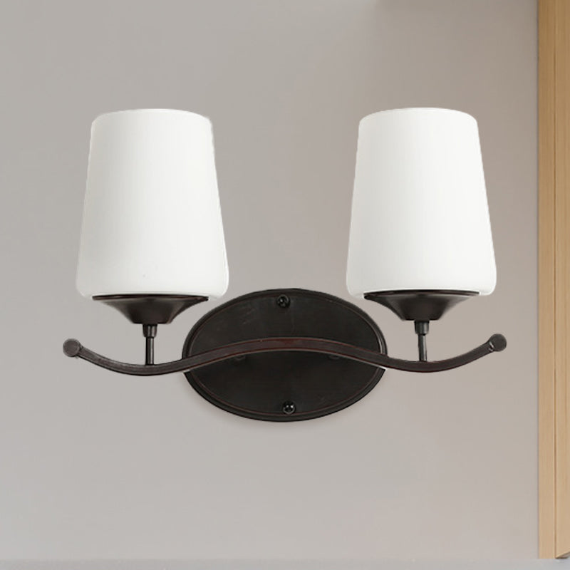 Ivory Glass Vanity Lighting With Iron Wavy Arm - Traditional Black Tapered Wall Light For Bedroom