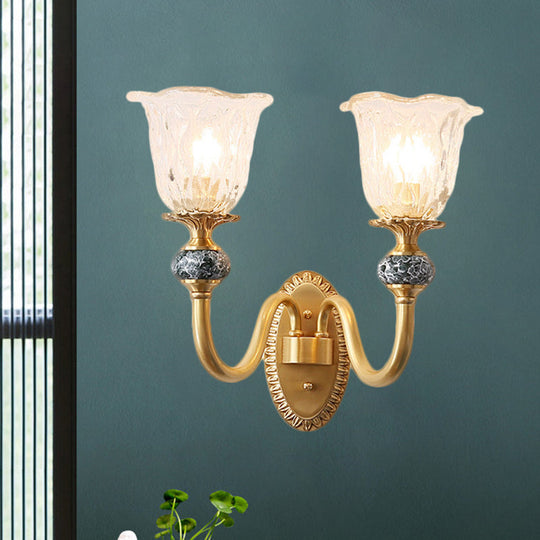 Classic Brass Floral Wall Sconce With Clear Ribbed Glass And Swooping Arm - 1/2-Head Mount Lamp