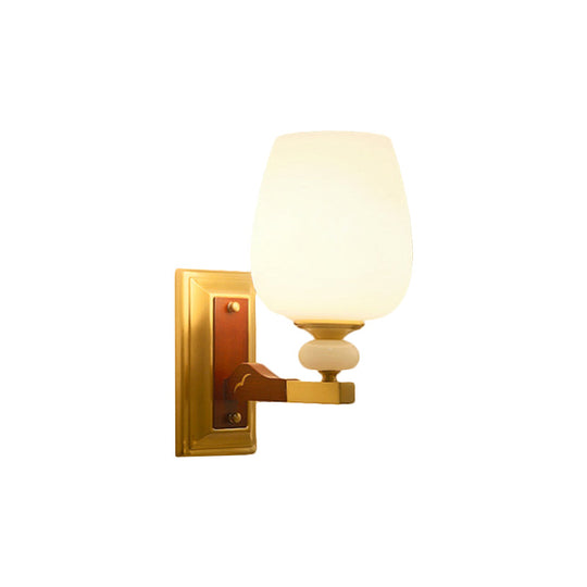 Brass Single Light Wall Mount Lamp With Opal Glass Cup Shape - Angled Lighting Idea
