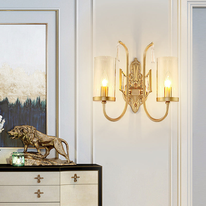 Country Clear Glass Wall Sconce With Curved Arm - Gold Cylinder Surface Lighting For Living Room