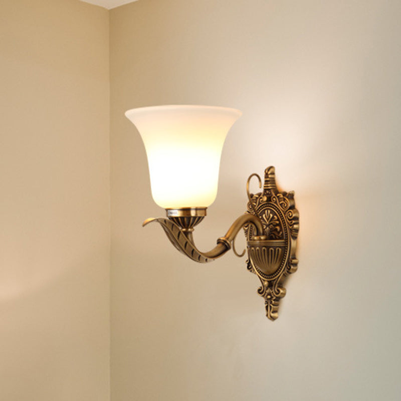 Opal Glass Brass Wall Mount Light - Traditional Style With Carved Backplate 1 Bell Shade