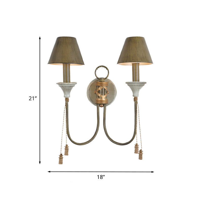 Vintage Iron Swooping Arm Sconce Light - Gold Wall Mount Lamp With Tapered Shade And Carved Spike