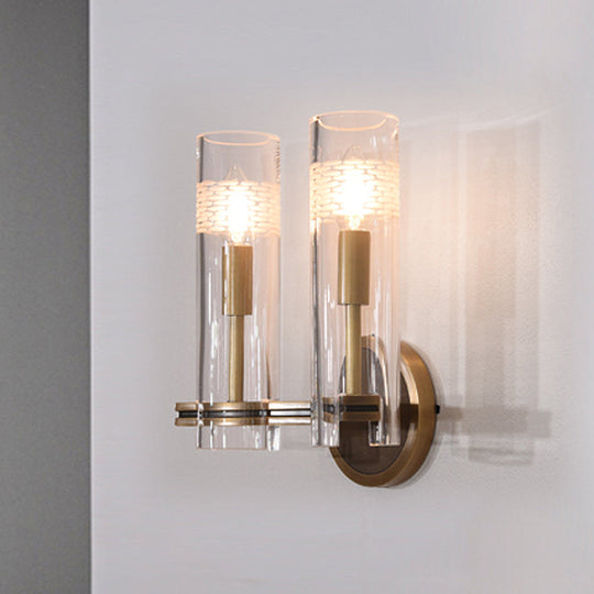 Colonialist Gold Wall Sconce With Clear Cylindrical Glass - Perfect For Living Room Lighting