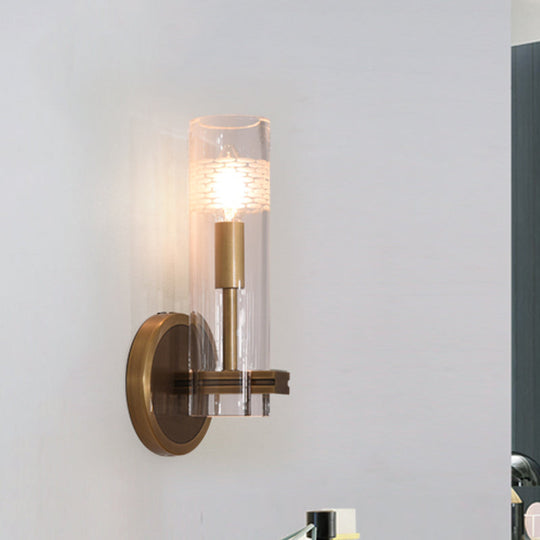 Colonialist Gold Wall Sconce With Clear Cylindrical Glass - Perfect For Living Room Lighting