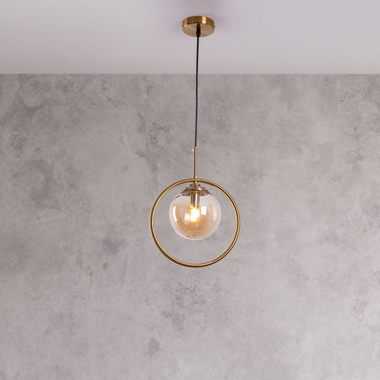 Postmodern Glass Pendant Light With Globe Down Lighting And Brass Ring For Bedroom Amber