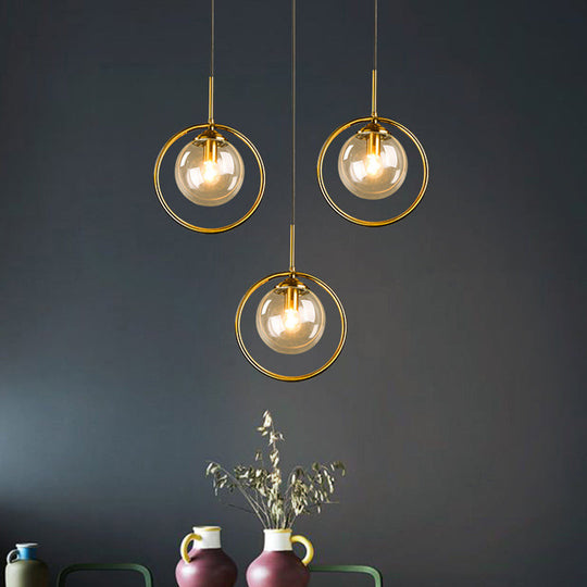 Postmodern Glass Pendant Light With Globe Down Lighting And Brass Ring For Bedroom