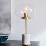Clear Glass Night Light With Minimalist Oval Design Brass Accents And Marble Base White