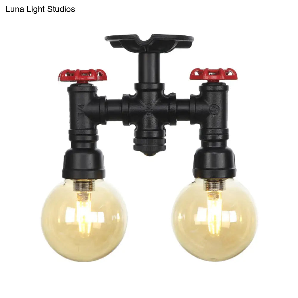 2-Head Semi-Flush Industrial Ball Amber Glass Ceiling Fixture In Black