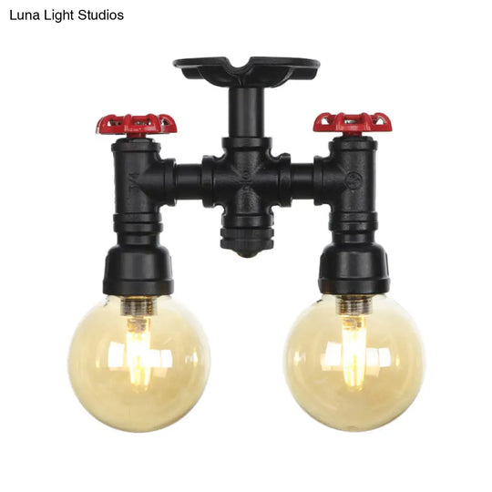 2-Head Semi-Flush Industrial Ball Amber Glass Ceiling Fixture In Black