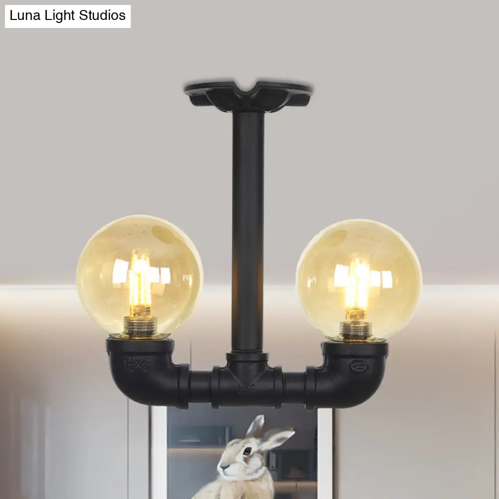 2-Head Semi-Flush Industrial Ball Amber Glass Ceiling Fixture In Black / A