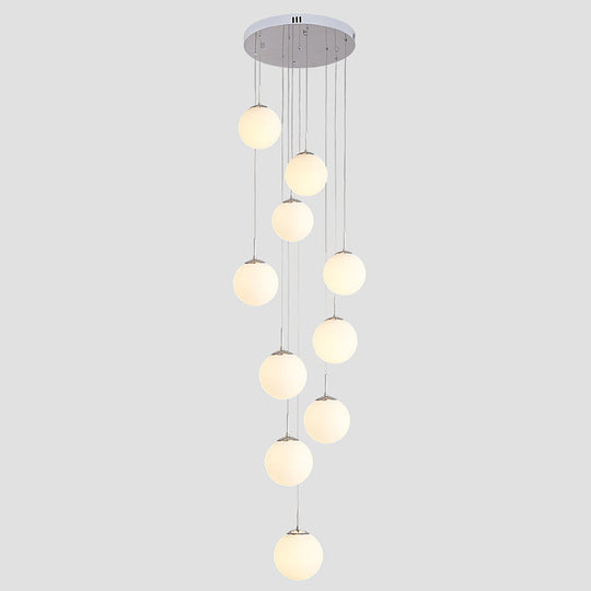 Sleek Silver Staircase Pendant Light With Cream Glass Shades - 10 Head Cluster Design
