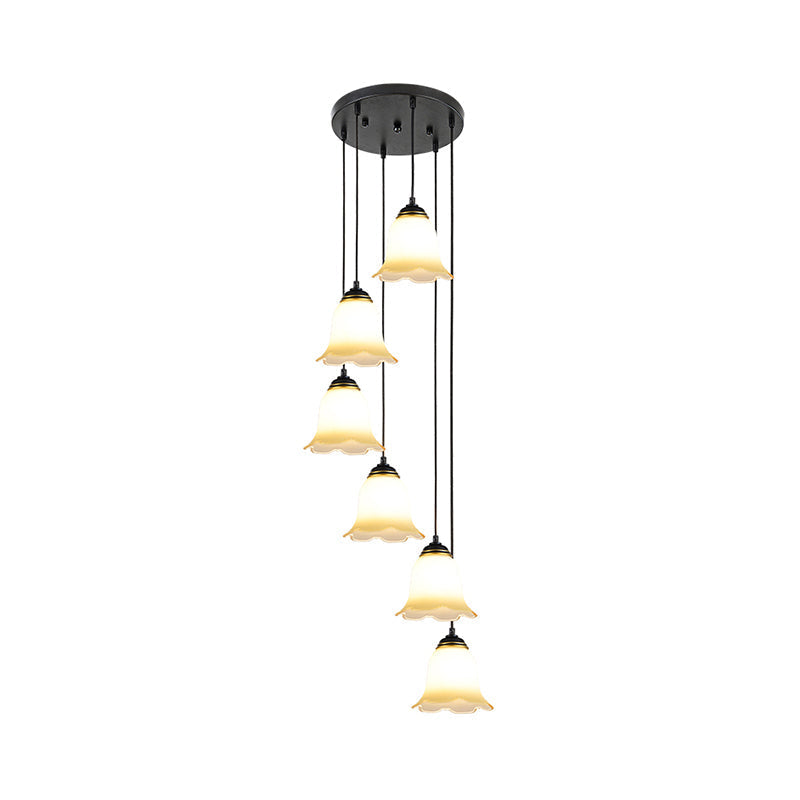 Minimalist Black Flower Stairs Pendant Light With Frosted Glass And Round Canopy