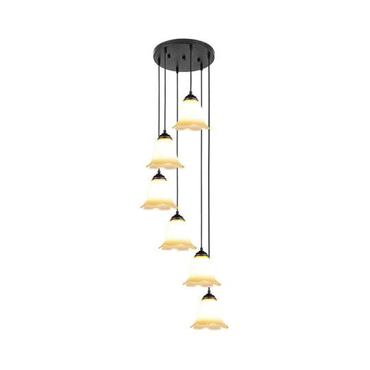 Minimalist Black Flower Stairs Pendant Light With Frosted Glass And Round Canopy
