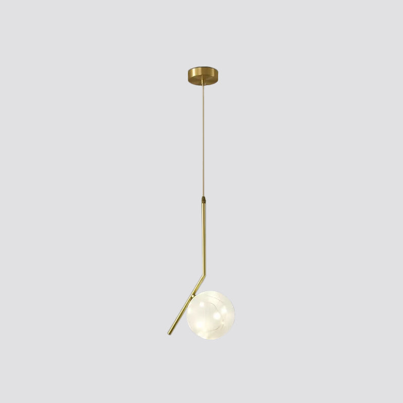 Sleek Brass Sphere Led Pendant Lamp For Modern Dining Rooms