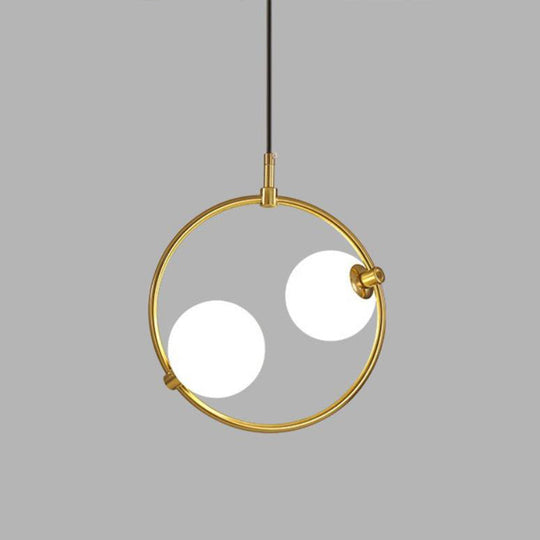 Minimalist Milky Glass Orb Pendant Light With Gold Pendulum And Metal Frame