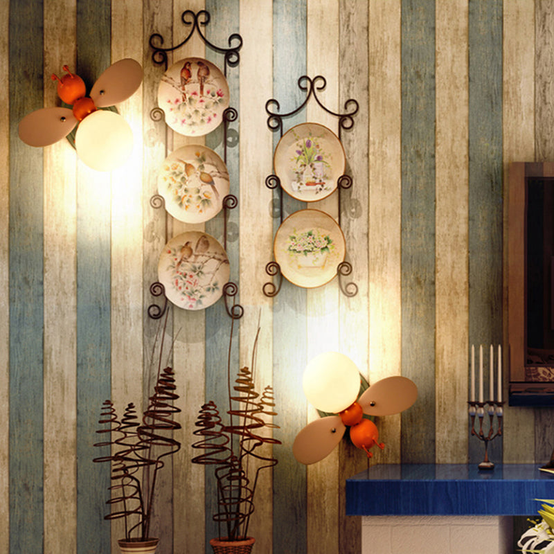 Bee Shaped Child Room Sconce Lighting: Modern Metallic Wall Light With Cream Glass Shade In Yellow