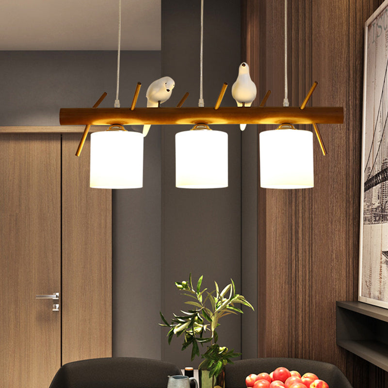 White Glass Led Pendant Light With Resin Bird - Cylinder Restaurant Island Hanging Fixture