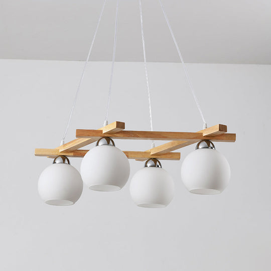 Japanese Style 4-Bulb Cream Glass Sphere Pendant Chandelier For Living Room In Wood