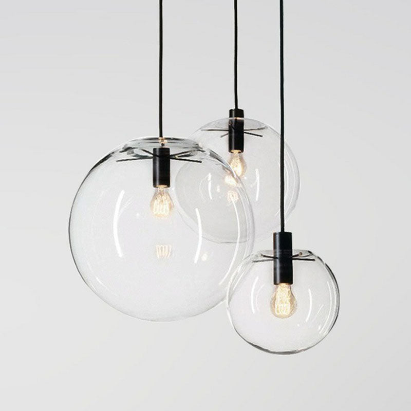 Minimalistic 1-Light Black Pendant Light Fixture - Clear Glass Globe Design For Restaurants