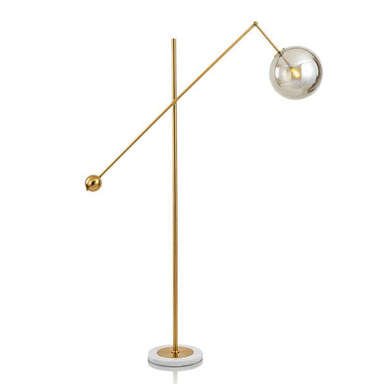 Postmodern Brass Plated Balance Arm Floor Lamp With Glass Spherical Shade - Stylish Metal Stand-Up