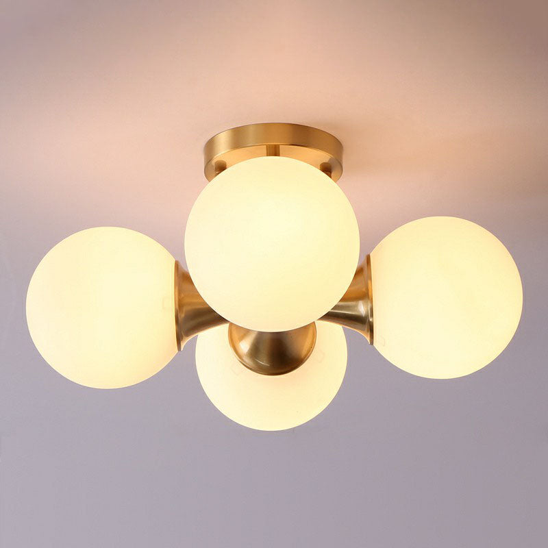 Postmodern Gold Finish Flush Mount Ceiling Light With White Glass Ball