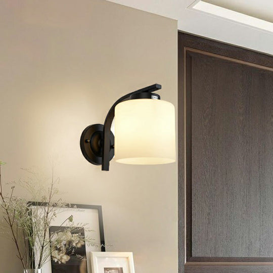 Sleek White Glass Wall Sconce With Black Accents For Living Room