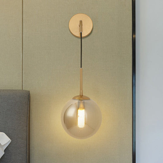 Sleek Silver Glass Ball Wall Hanging Lamp With Brass Mount - Perfect Bedroom Lighting Solution
