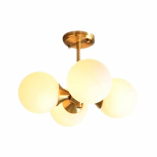 Brass Globe Semi Flush Mount Light With Opal Glass - Postmodern Design For Bedroom