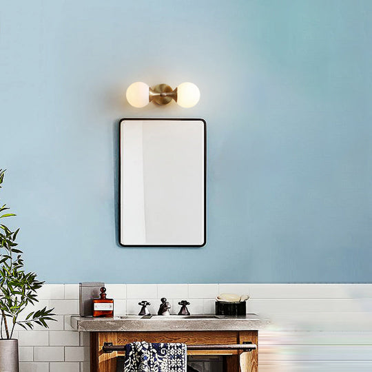 Ivory Glass Ball Wall Lamp With 2-Head Brass Sconce For Bedroom